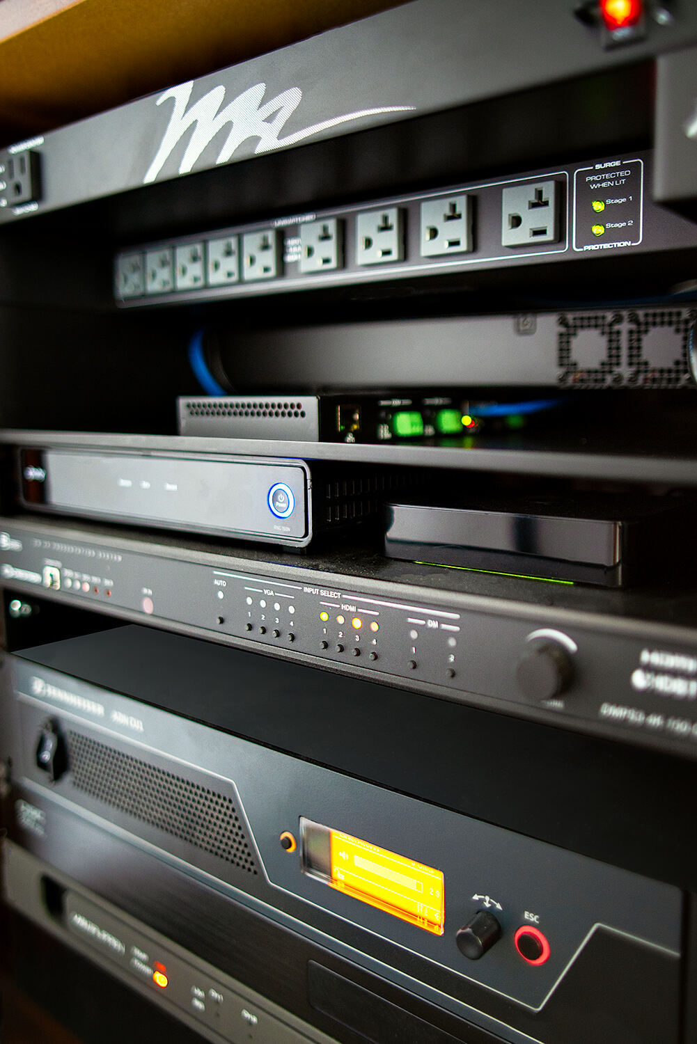 Equipment rack with organized components and connected cabling